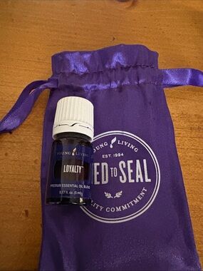 Young Living Loyalty Essential Oil with Purple Drawstring Pouch